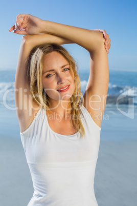 Gorgeous happy blonde posing at the beach