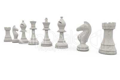 White chess pieces in a row