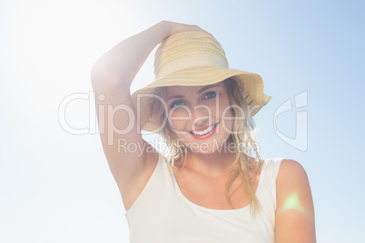 Gorgeous happy blonde posing at the beach