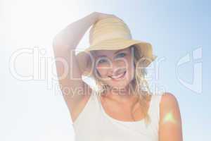 Gorgeous happy blonde posing at the beach