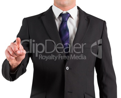 Businessman in suit pointing finger