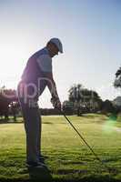 Golfer teeing off for the day