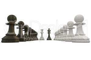 Wooden chess pieces facing off