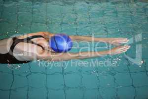 Fit woman swimming in the pool