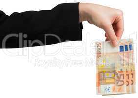 Businesswomans hand holding fifty euro notes