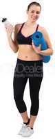 Fit brunette holding mat and sports bottle