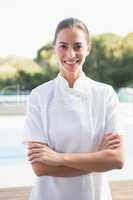 Smiling beauty therapist looking at camera