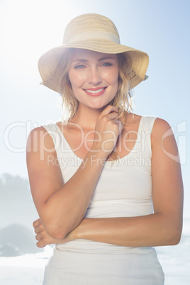 Gorgeous happy blonde posing at the beach