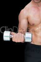 Strong crossfitter lifting up heavy dumbbell