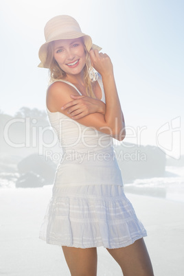 Gorgeous happy blonde posing at the beach