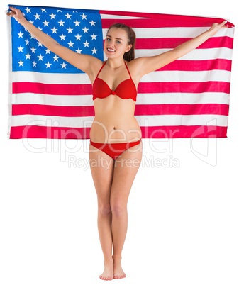 Pretty girl in bikini with american flag