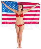 Pretty girl in bikini with american flag