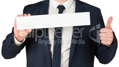 Businessman showing card and thumbs up