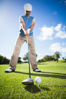 Golfer about to tee off
