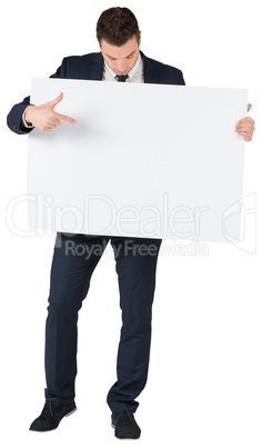 Businessman showing card to camera