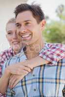 Young hip couple wearing check shirts