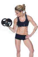 Female bodybuilder holding large black dumbbell with arm up look