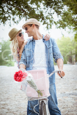 Hip young couple going for a bike ride