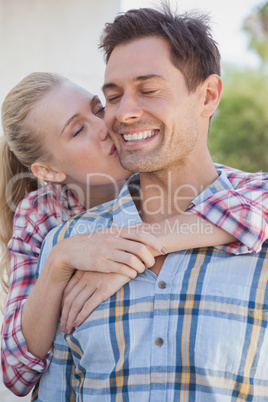Young hip couple wearing check shirts