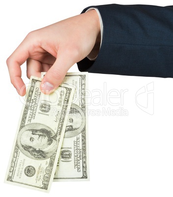 Hand holding hundred dollar bills
