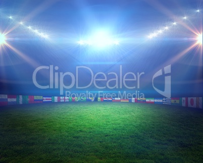 Football pitch with lights and flags