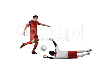 Football players tackling for the ball Football players tackling for the ball