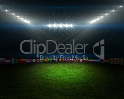 Football pitch with flags and lights