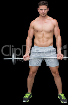 Serious handsome crossfitter lifting up barbell