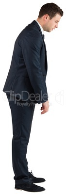 Businessman standing and bowing