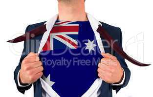 Businessman opening shirt to reveal australia flag