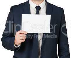 Businessman showing card to camera