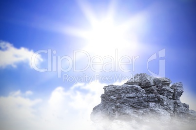 Large rock overlooking bright sky