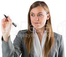 Smiling businesswoman writing with pen