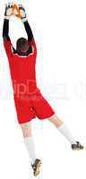 Goalkeeper in red jumping up