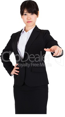 Businesswoman in suit pointing finger Businesswoman in suit pointing finger