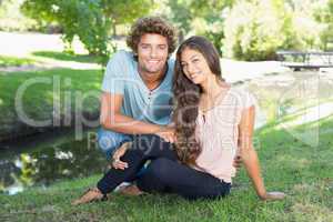 Cute couple relaxing in the park