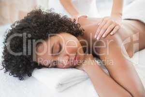 Gorgeous woman enjoying a shoulder massage