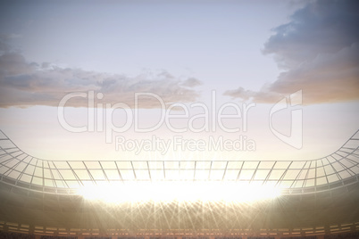 Large football stadium with spotlights