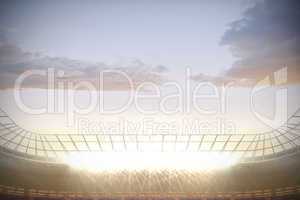 Large football stadium with spotlights