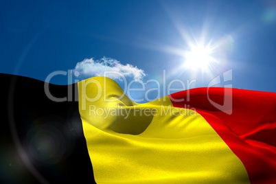 Belgian national flag under sunny sky