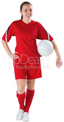 Cute football player holding ball Cute football player holding ball