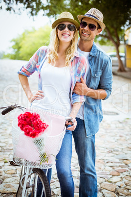 Hip young couple going for a bike ride