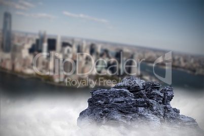 Large rock overlooking island city