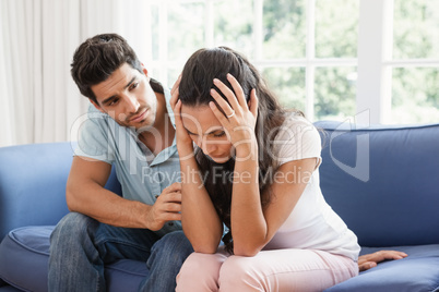 Man comforting his upset partner