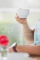 Man sitting in cafe having coffee