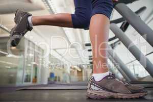 Fit woman running on the treadmill