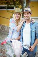 Hip young couple going for a bike ride