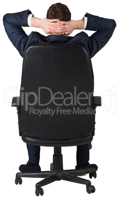 Businessman sitting in swivel chair Businessman sitting in swivel chair