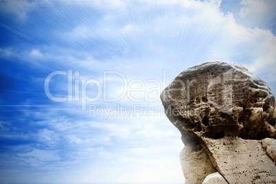 Large rock overlooking bright sky