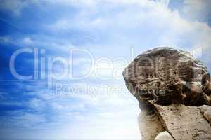 Large rock overlooking bright sky